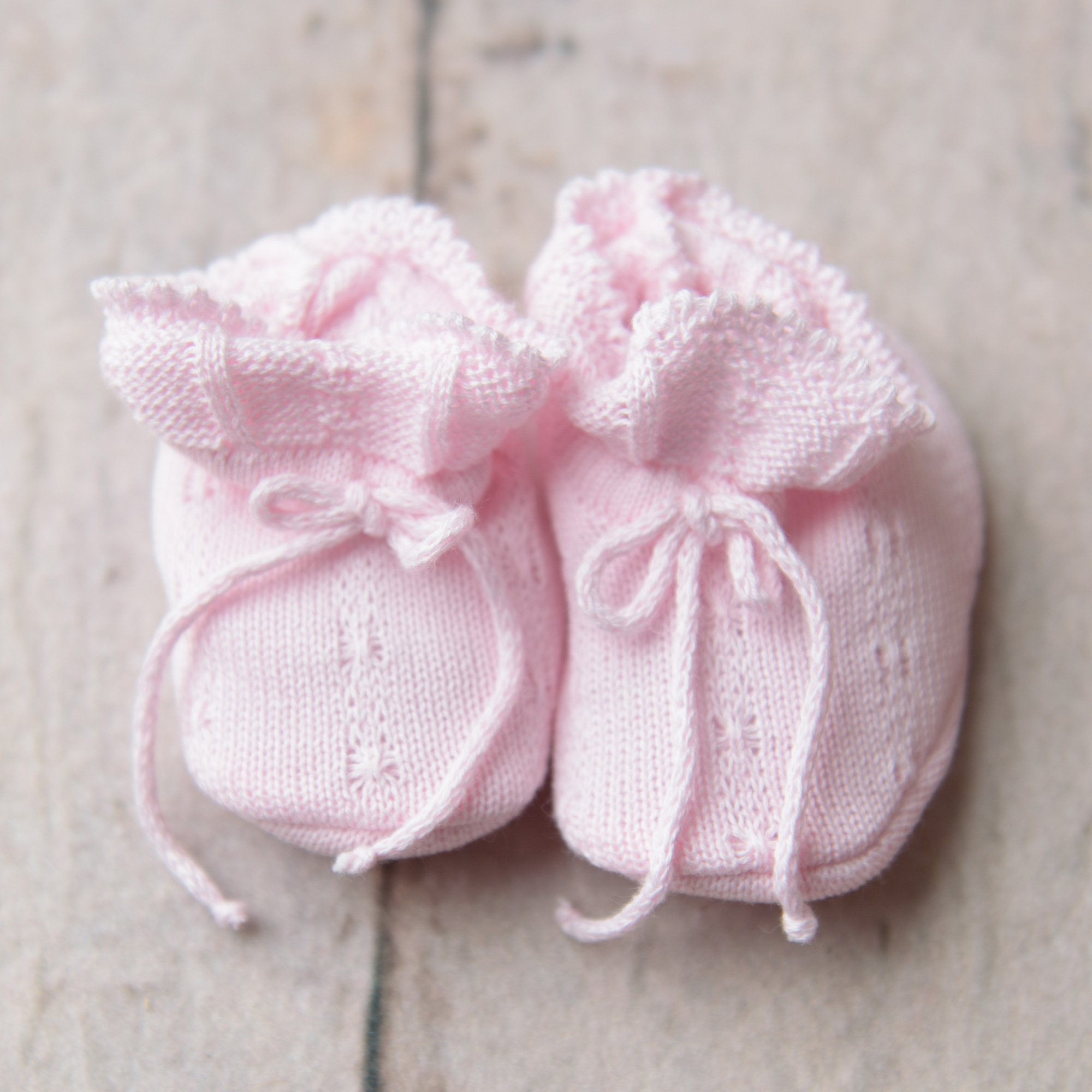pink newborn booties