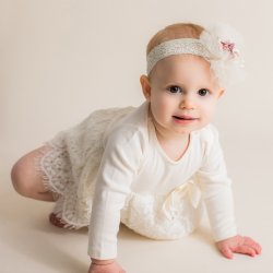 Mae Li Rose "Emily" Lace and Bow Onesie in Ivory