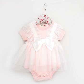 Mae Li Rose Lace and Bow Onesie in Soft Peach